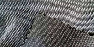 What are the properties of flame retardant Oxford 900D fabric?